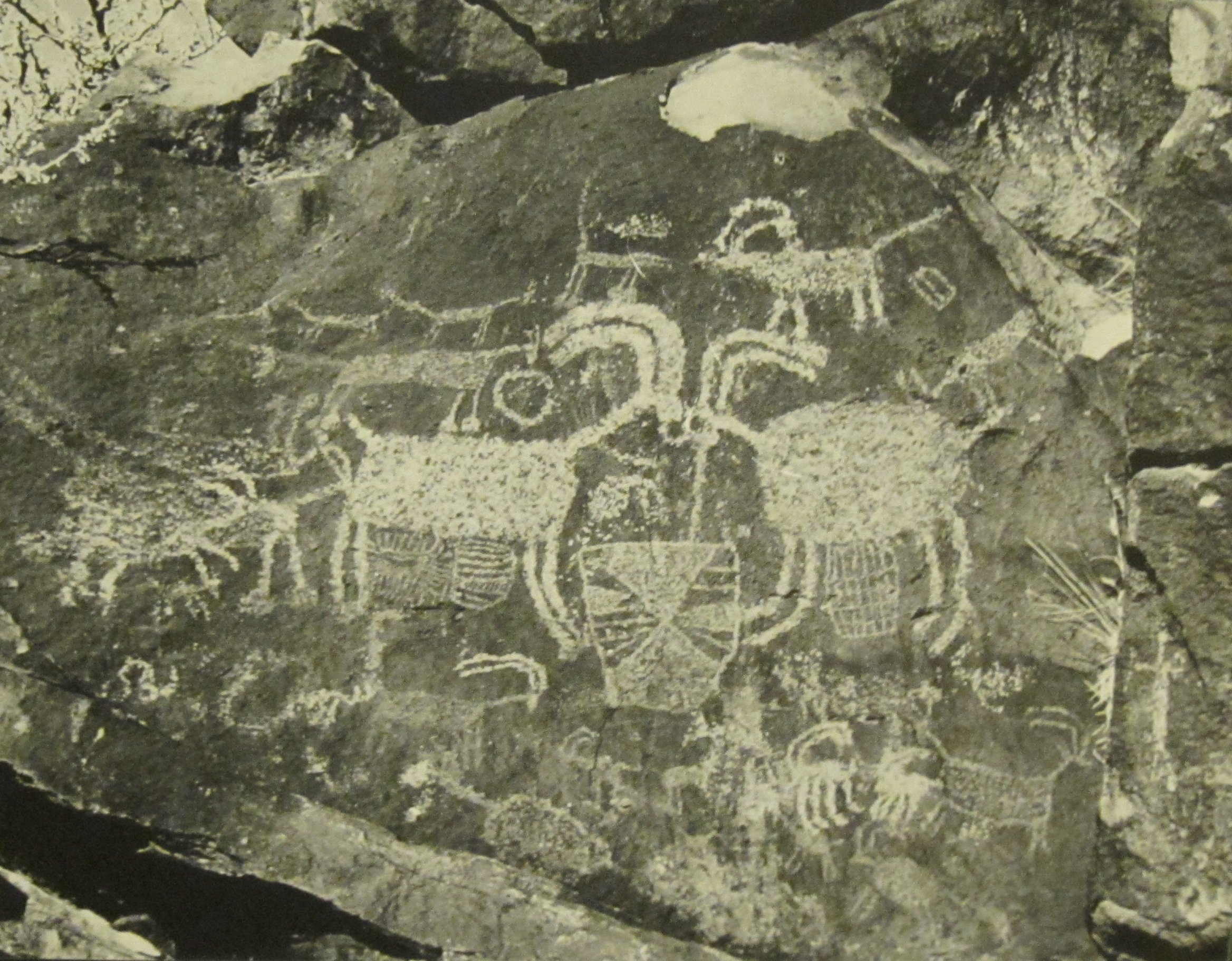 Petroglyph panel at the Coso Rock Art District, Mojave Desert, California, the region where quartz-hammerstone rock art has been documented.